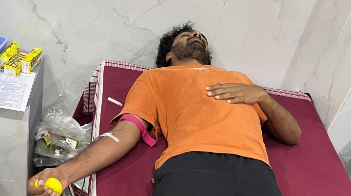 Volunteers distributing food boxes